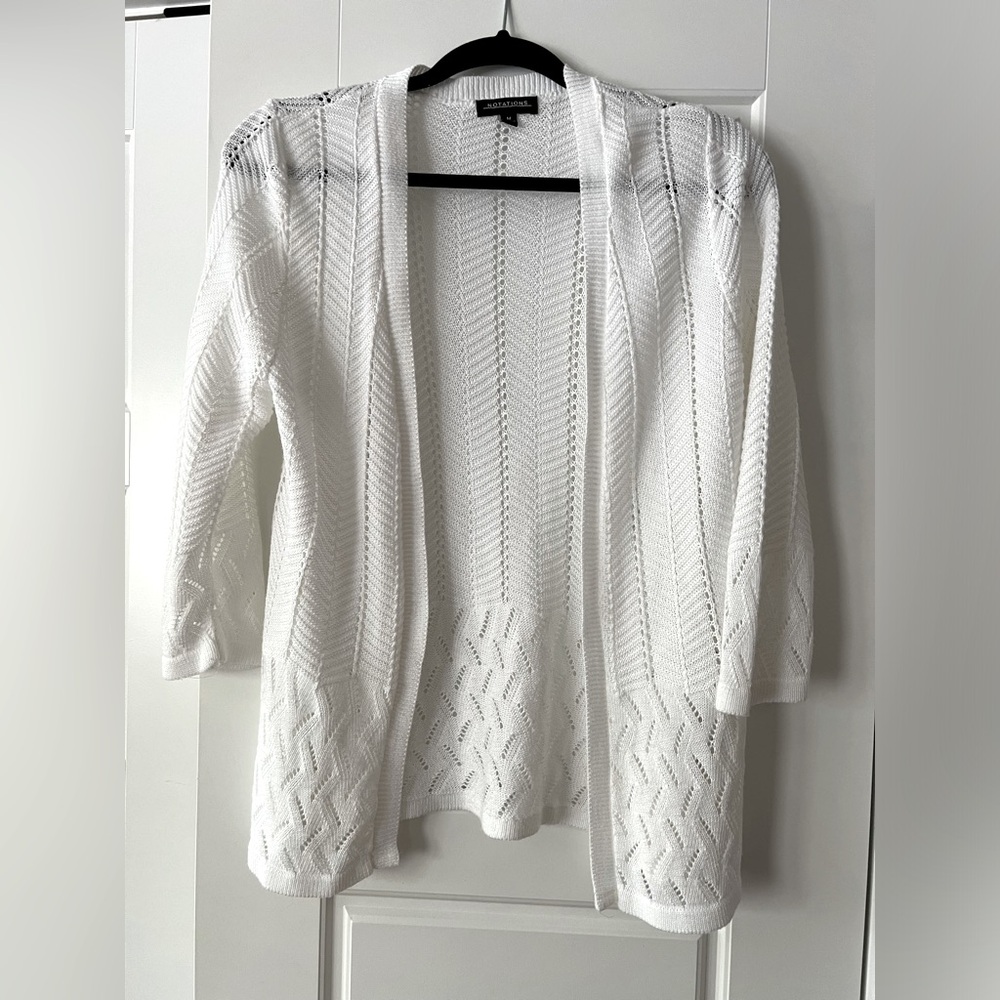 White sweater.